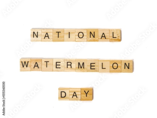 Wooden letter blocks spelling “National Watermelon Day” on white background. Clean minimal style for seasonal holiday celebration and summer-themed content.