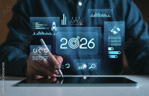 Businessman using tablet with 2026 futuristic data interface graphics overlayed.