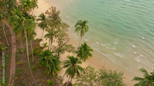Aerial view of evening light painting Ao Taphao sands, Koh Kood, Thailand. Aerial drone video