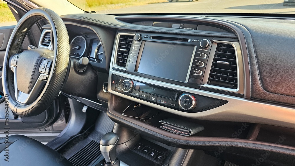 Car Interior View Dashboard, Steering Wheel and Console Offering Comfortable Ride Experience Car Interior View Dashboard, Steering Wheel and Console Offering Comfortable Ride Experience