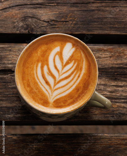 cup of coffee on wooden table