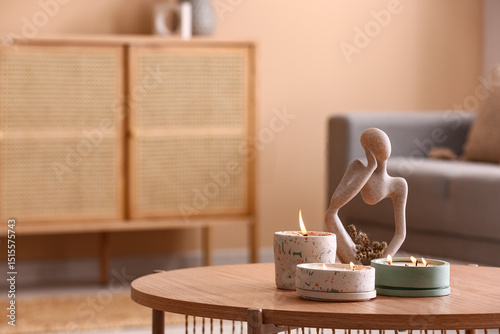Holders with burning candle...