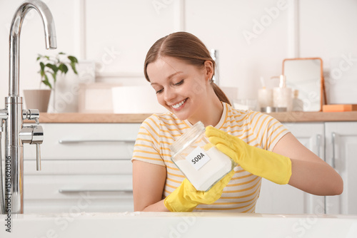 Young woman with baking sod...