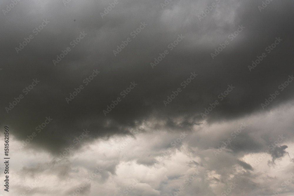 Fototapeta premium Dramatic dark storm thundercloud rain clouds on black sky background. Dark thunderstorm clouds rainny landscape. Meteorology danger windstorm disaster climate. Dark cloudscape storm disaster gray sky