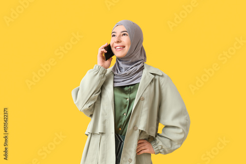 Happy young Muslim woman in...