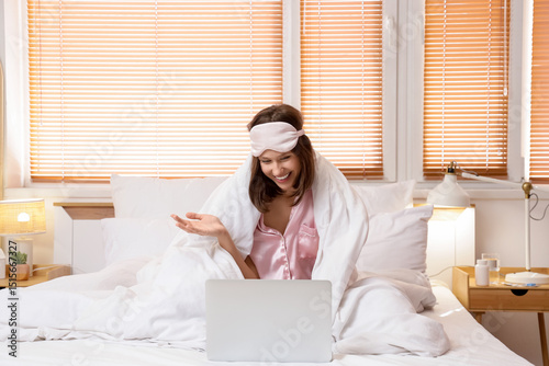 Happy young woman with slee...