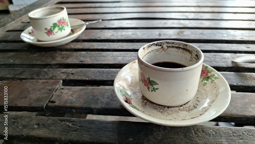 Coffee grounds grains that stick to the edge of the cup. Typical Indonesian Javanese Coffee. Original coffee with simple processing	
