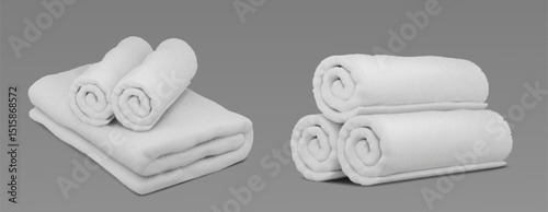 Folded white spa towel linens on gray background - rolled bath textiles stacked on neat pile. Fresh clean cotton terry cloth for hotel bathroom or wellness center display. Soft luxury fabric.
