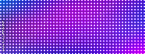 Led pixel screen display with bright blue and purple dots forming digital wall background. Futuristic technology pattern for video walls, presentations or electronic advertising. Tv display panel