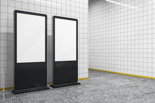 Fototapeta Naklejka Na Ścianę i Meble -  Two vertical blank digital advertising display mockups in tiled subway corridor with clean modern background for branding and promotion concepts. 3D Rendering