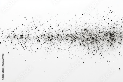 Dark particles scattered across a white background