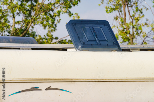 Sunroof, raisable window on roof top of camper