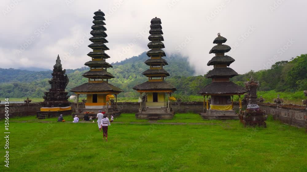 custom made wallpaper toronto digitalBali temple on background volcanic lake. Bali famous landmark and popular travel destination showcasing the rich culture Indonesia 4K Aerial view