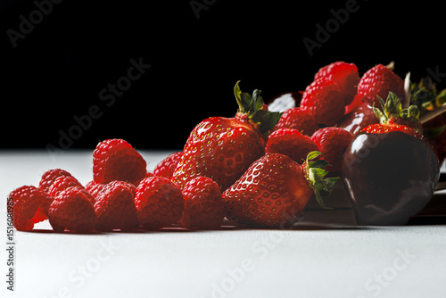 Elegant Chocolate-Dipped Strawberry & Raspberry Medley on Black