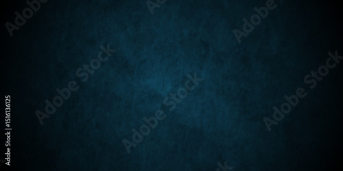 Dark Blue background with grunge backdrop texture, watercolor painted mottled blue background, colorful bright ink and watercolor textures on black paper background.