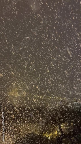 Heavy snowfall in winter, view of Budapest city at night