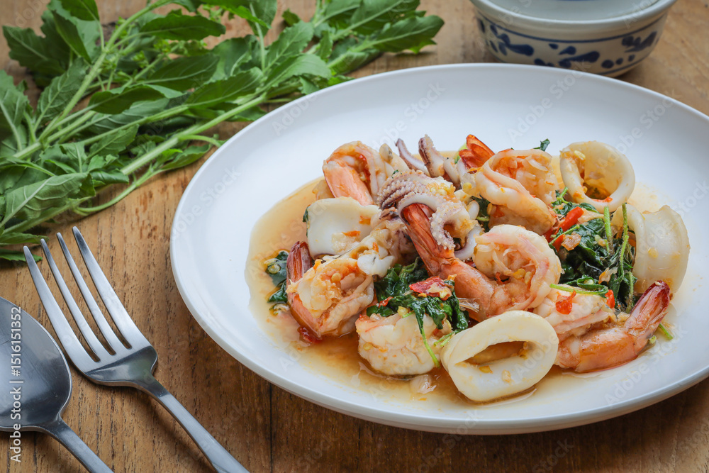 Stir-fried spicy seafood with basil (Stir-fried seafood with basil) A popular Thai dish that is typical of popular Thai street food. The concept of Thai food, original recipes