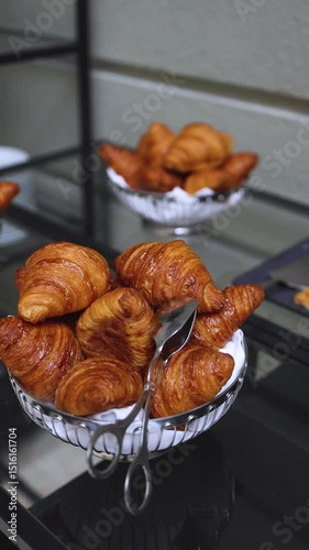 Set of coffee break in the hotel during conference meeting, with tea and coffee catering, decorated catering banquet table with variety of different pastry and bakery, with croissants, pie and cookies