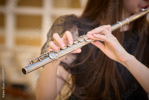 Woman Playing Flute with Precision and Grace