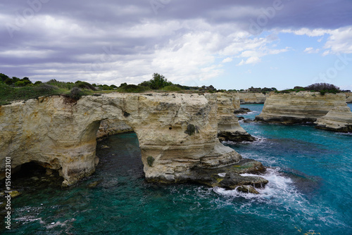 Fototapeta Naklejka Na Ścianę i Meble -  Cliffs and rock formations in the sea, Sant'Andrea, Italy