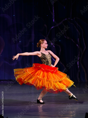 Girl dancing Carmen on stage. Dancer. Ballet.