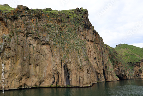Cliff face on the coast of Heimaey island- Vestmannaeyjar- Westman Islands-Iceland    photo