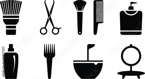 A collection of black and white beauty salon equipment including brushes scissors and other tools