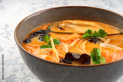 Laksa soup with coconut spicy broth.