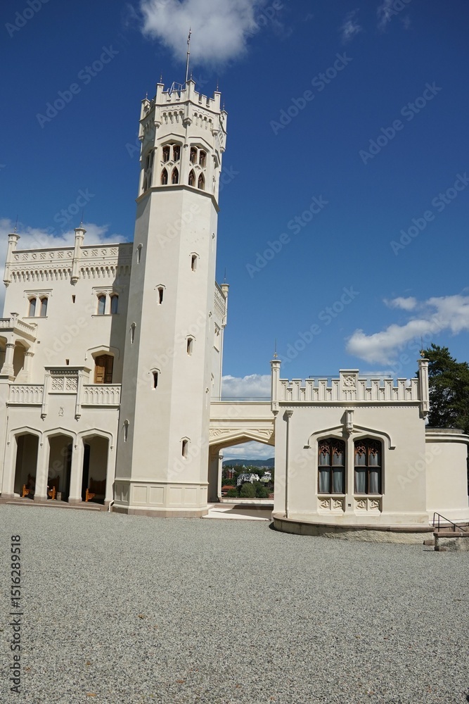 Fototapeta premium Castle with Tower Against Blue Sky
