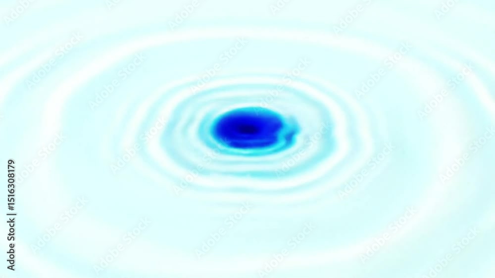 A blue water droplet creating ripples on a light blue surface close up view