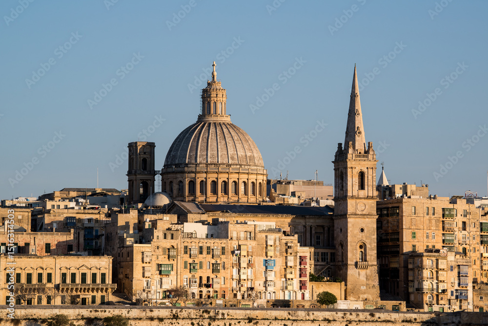 Fototapeta premium View of a part of Valletta city and the dome of Carmelite Church at the middle, at the island of Malta in the Mediterranean Sea. 