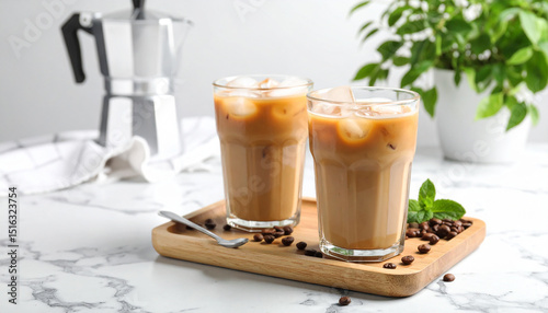 Hot chocolate drinks with whipped cream, cinnamon, and nuts in a glass mug