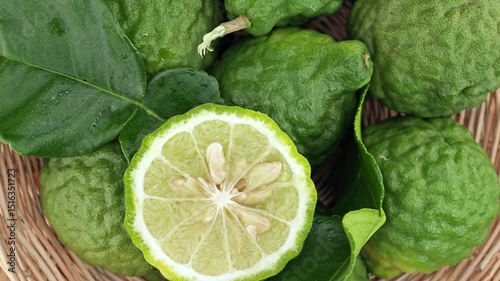 Fresh Kaffir Lime Rotating on Wooden.