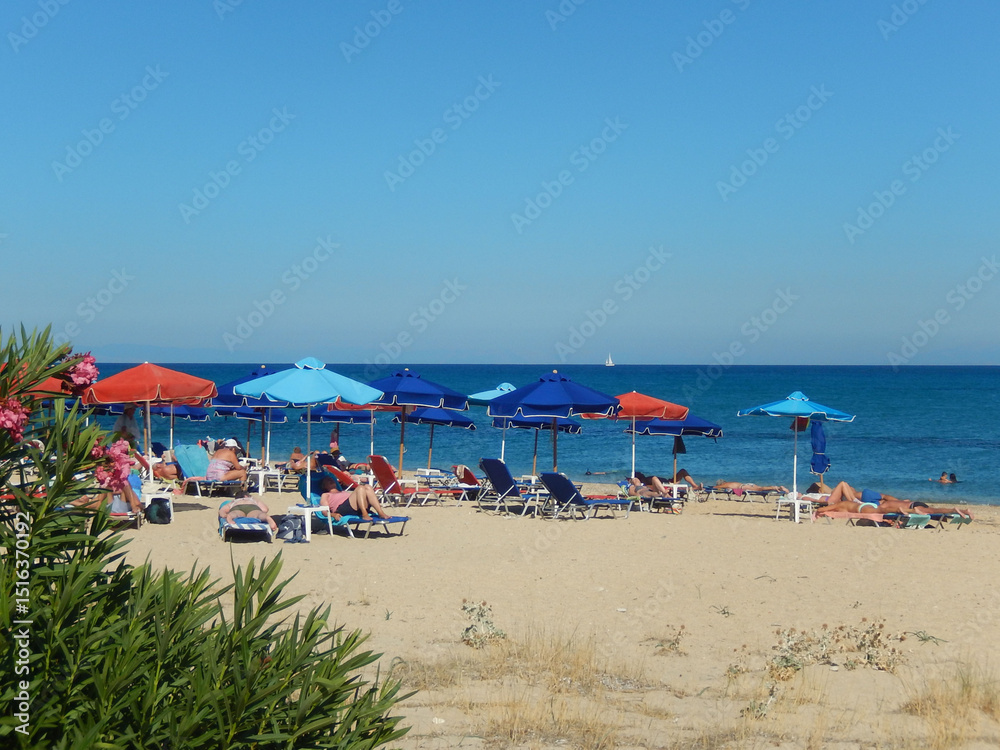 Obraz premium Beach, sun, sand and people