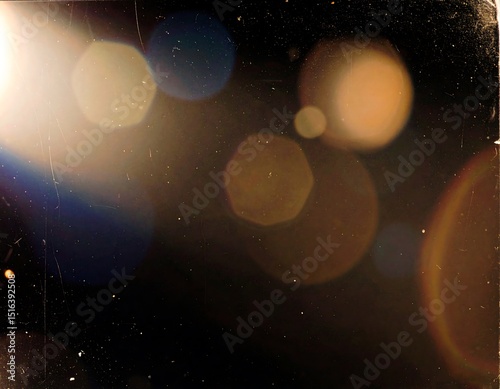 Vintage lens flare on dark background