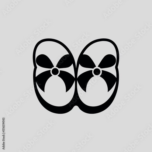 Vector illustration of baby booties with black bows on a light gray background