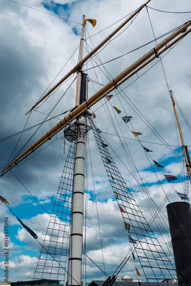 Fototapeta premium Tall Ship Mast and Rigging Against Cloudy Sky