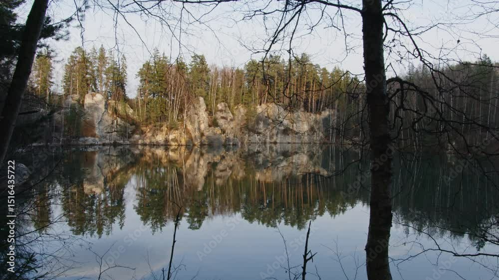 Beautiful view of ducks in Adršpašské pond, landscape of the Adrspach-Teplice Mountain Park in the Broumov Uplands region of Bohemia, Czech Republic.