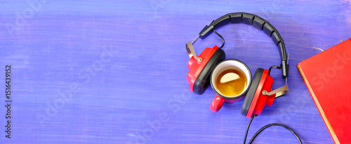 audiobooks concept with  books,vintage headphones and coffee cup,flat lay with free copy space.
