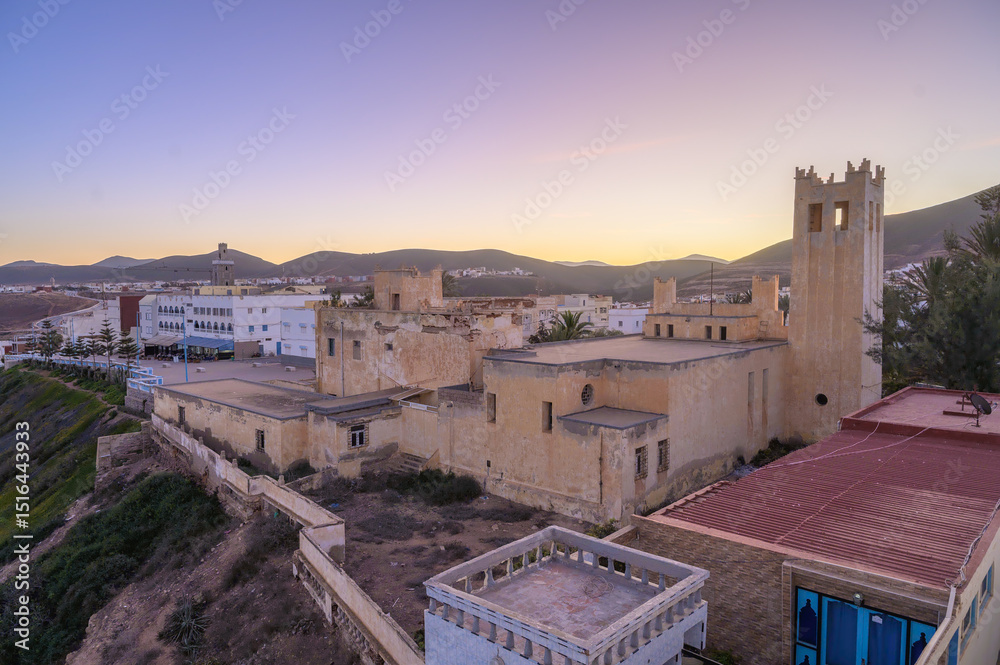 Fototapeta premium Exploring the historical church in Sidi Ifni, Morocco during sunset