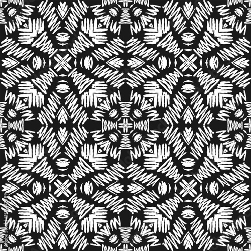 Seamless pattern with handwritten white ethnic ornament on black background. Vector illustration