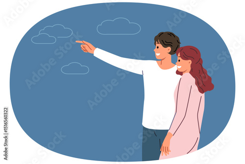 Couple in love with man pointing finger in direction telling bride about plans for future. Romantic couple of boyfriend and girlfriend look into distance dreaming of good honeymoon