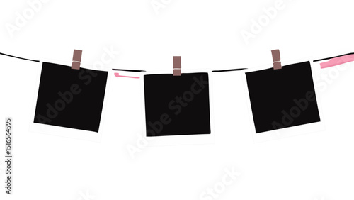 blank instant photos hanging on rope