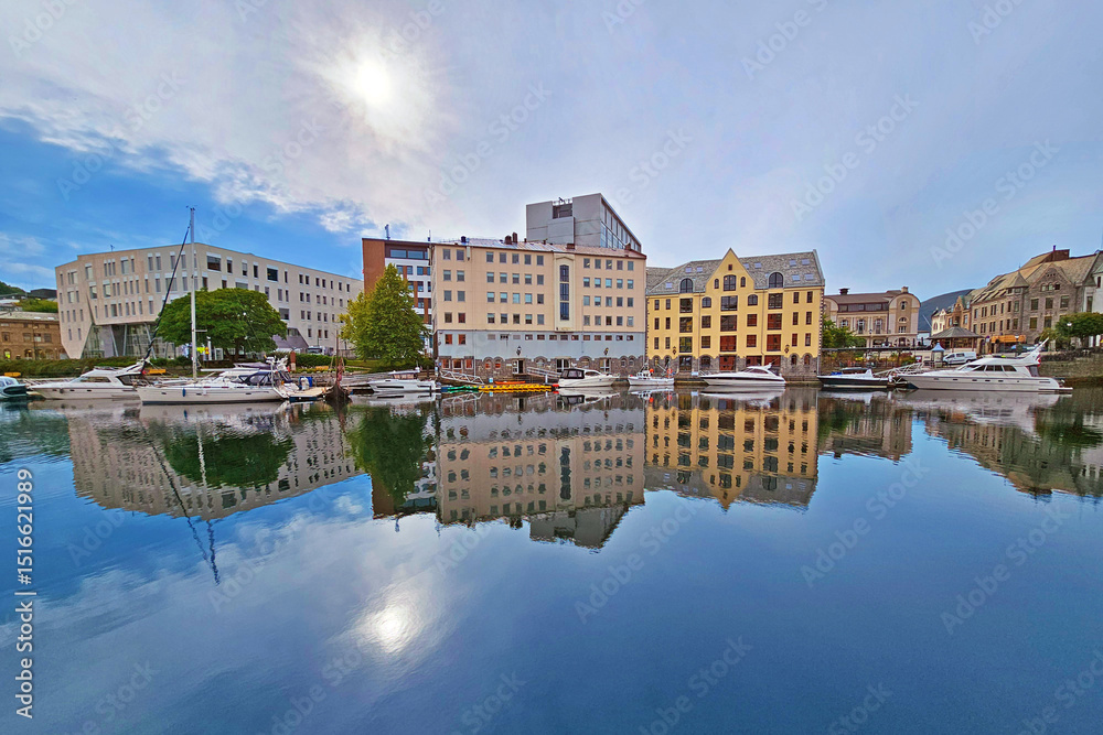 Fototapeta premium Cityscape of Alesund city on a sunny summer day, Norway. View of colorful Art Nouveau architecture port