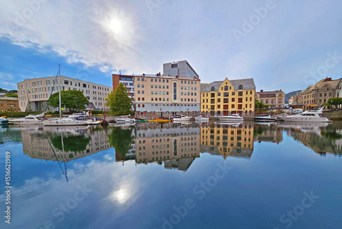 Cityscape of Alesund city on a sunny summer day, Norway. View of colorful Art Nouveau architecture port