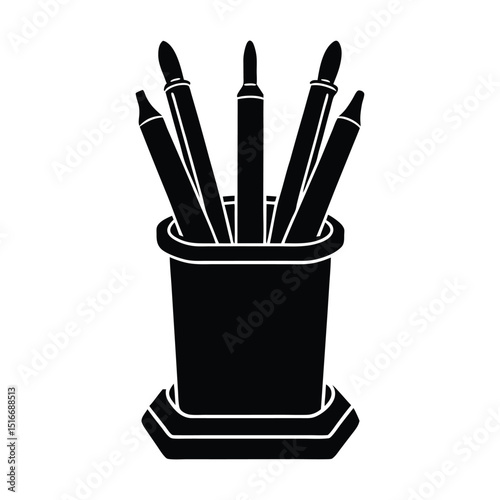 A vibrant group of colorful pencils and pens in a glass cup, perfect for school or office art and writing