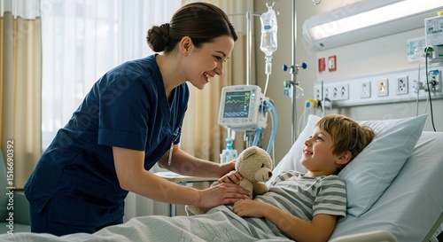 Caring nurse brings comfort to a young boy in a hospital bed with a teddy bear, offering support during his recovery.