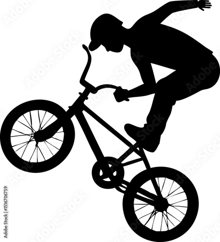 teen on bicycle performing stunt in urban light (1).eps