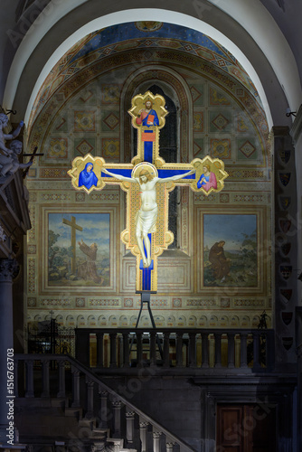 Tempera and gold painted crucifix by Giotto, c. 1315, originally placed above the presbytery, now in the left transept of Ognissanti Church, Florence, Italy.