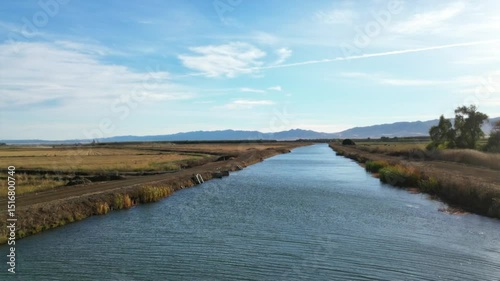 Wallpaper Mural Tranquil river flowing through fields Torontodigital.ca